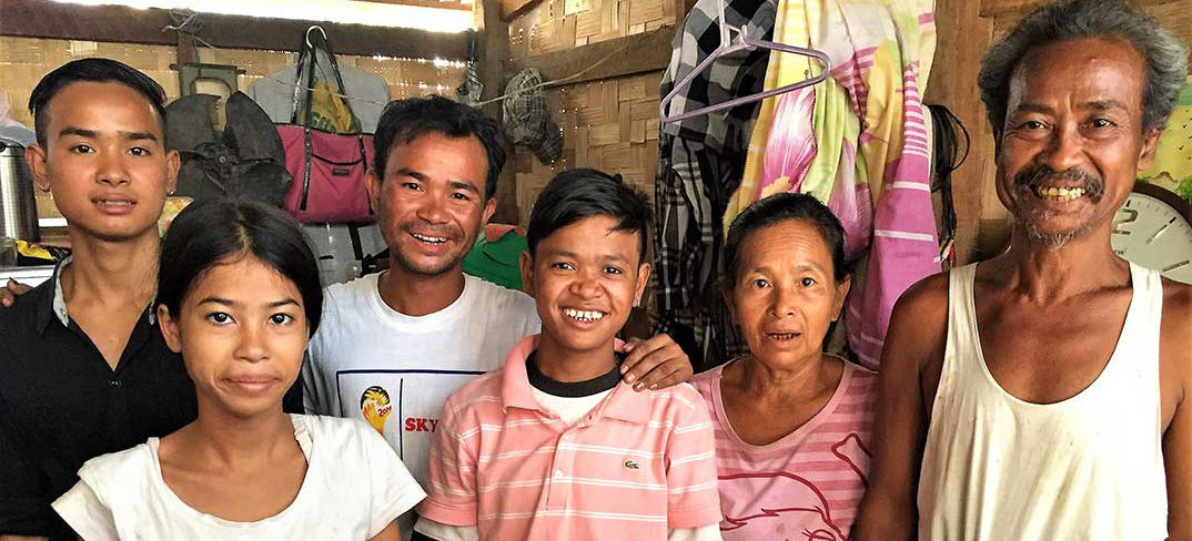 Family in Myanmar slum