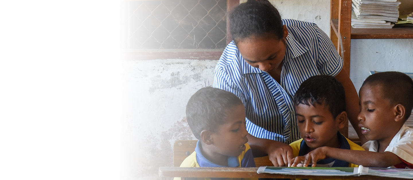 Students and teacher in Timor-Leste