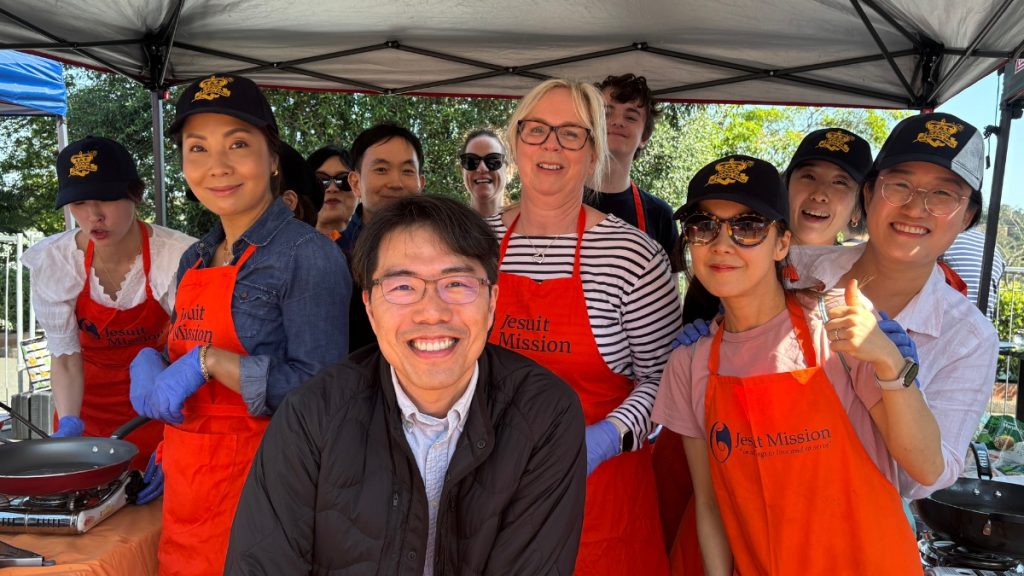 A group of volunteers serving at a food stall at the 2024 Bazaar