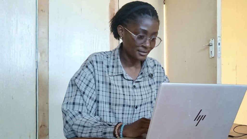 Nadine working on her laptop