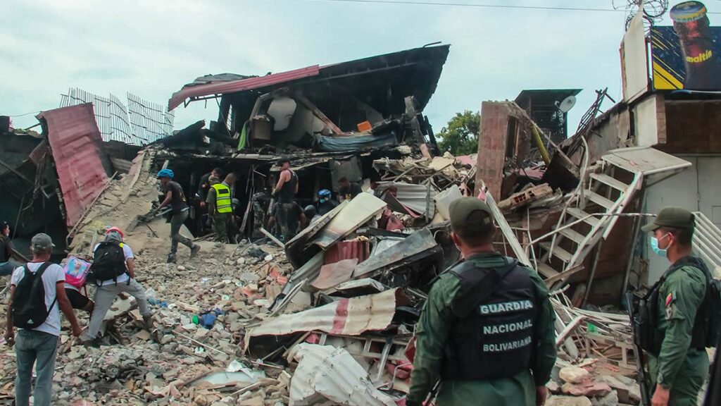 Rescue crews scour the rubble in search for survivors