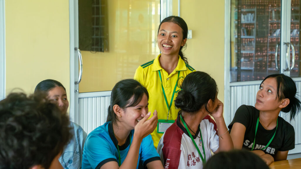 Chivita leading her classmates in a lesson